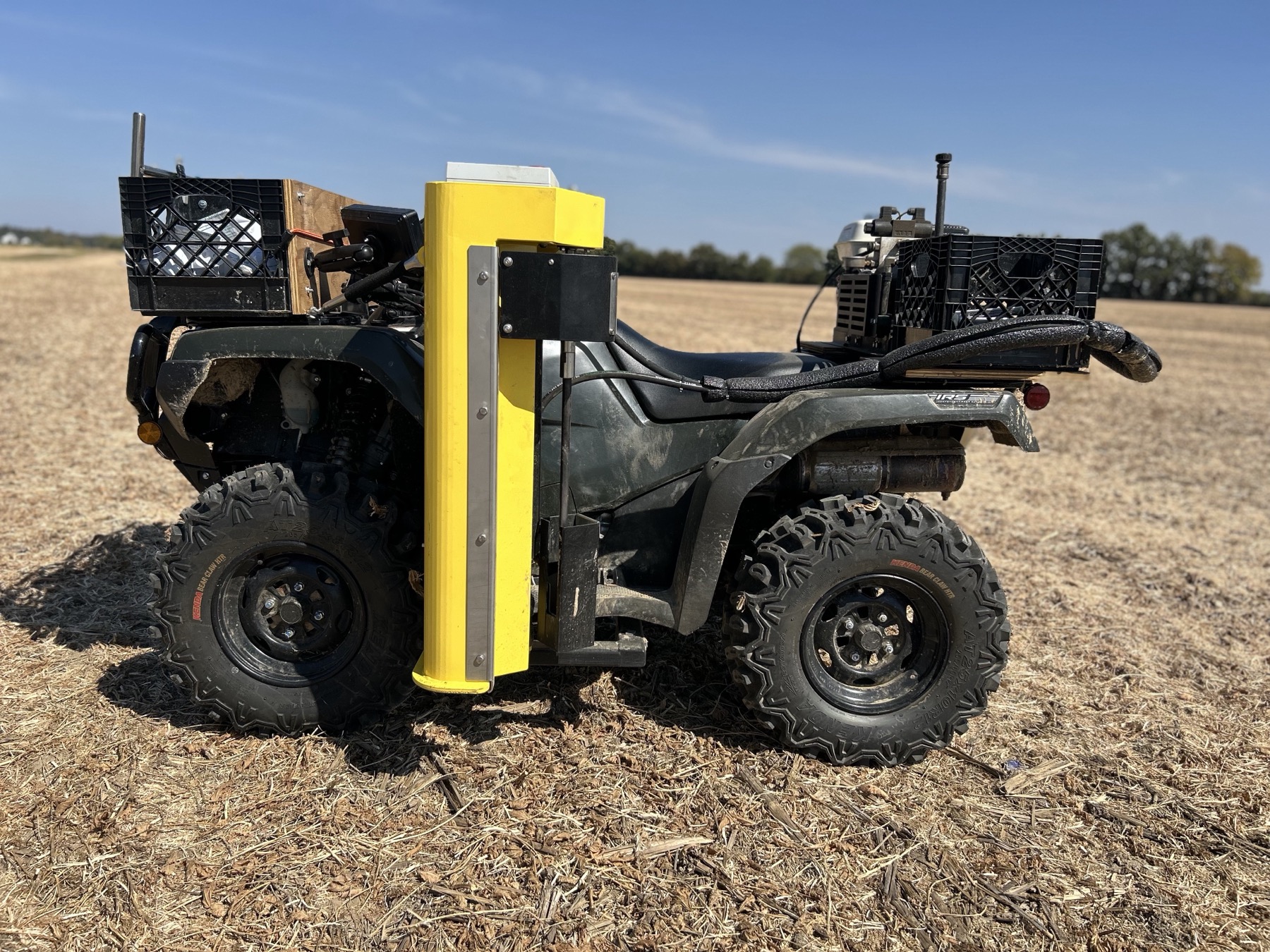 Woltz Ag ATV equipped with a hydraulic soil sampling probe in a harvested field
